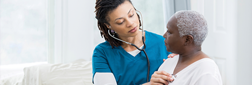 Image of a Healthcare Professional with a patient