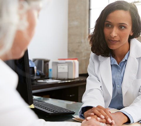 Image of a healthcare professional sitting at a desk