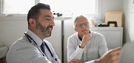 Image of a healthcare professional talking with a patient
